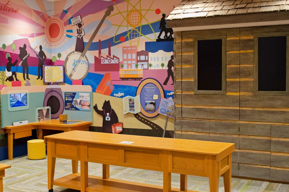 Make your own stop motion movies with backdrops from East Tennessee and see the log cabin that helps turn the gallery into a classroom setting.